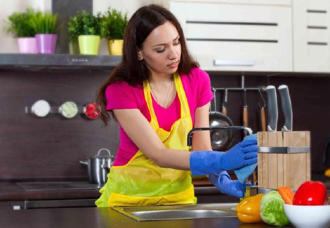 /bigstock-young-woman-cleaning-kitchen-56838374-c-r_928681269841575912.jpg